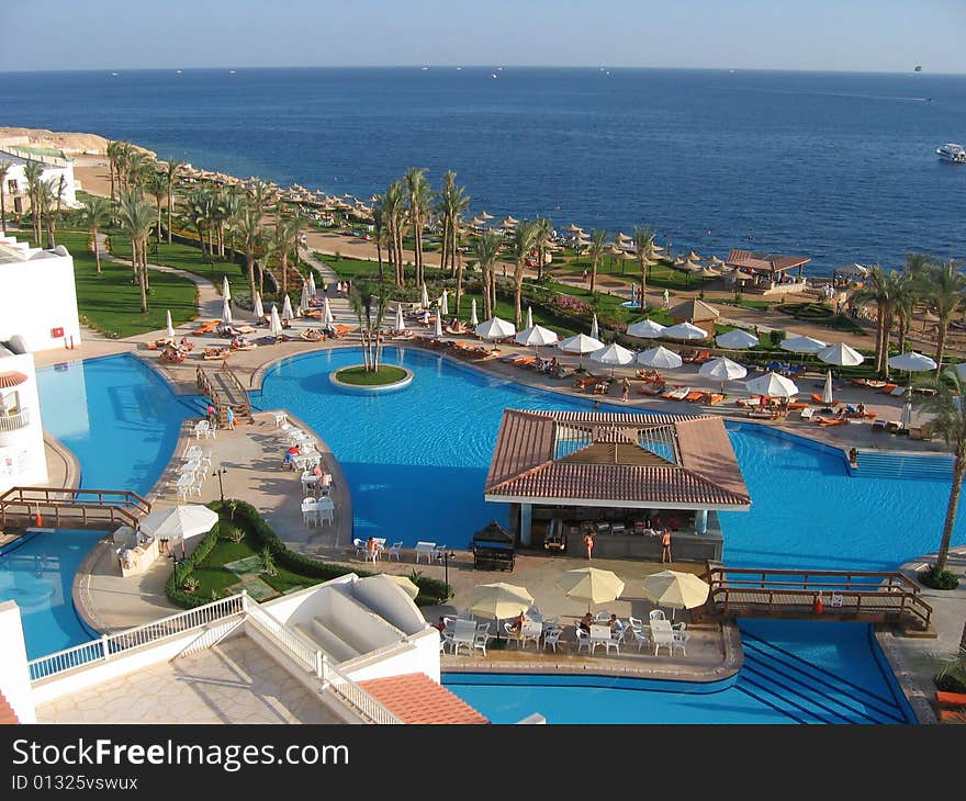 The beautiful top view on pool near the sea