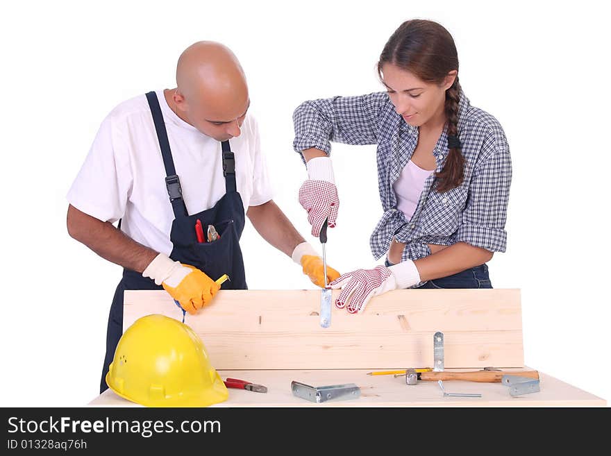 Construction workers at work on white background