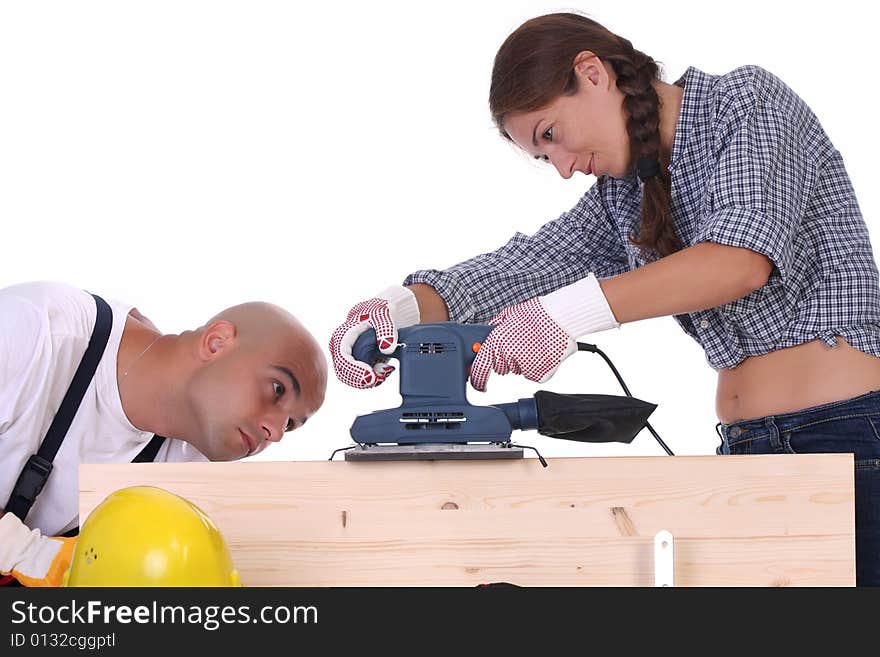 Construction workers at work on white background