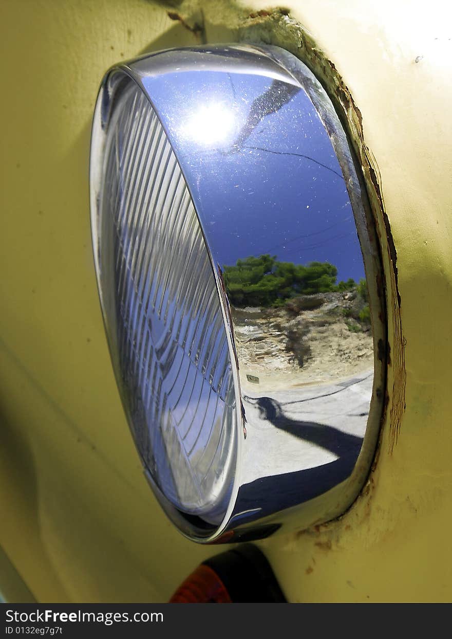 Detail of an old lights on automobiles