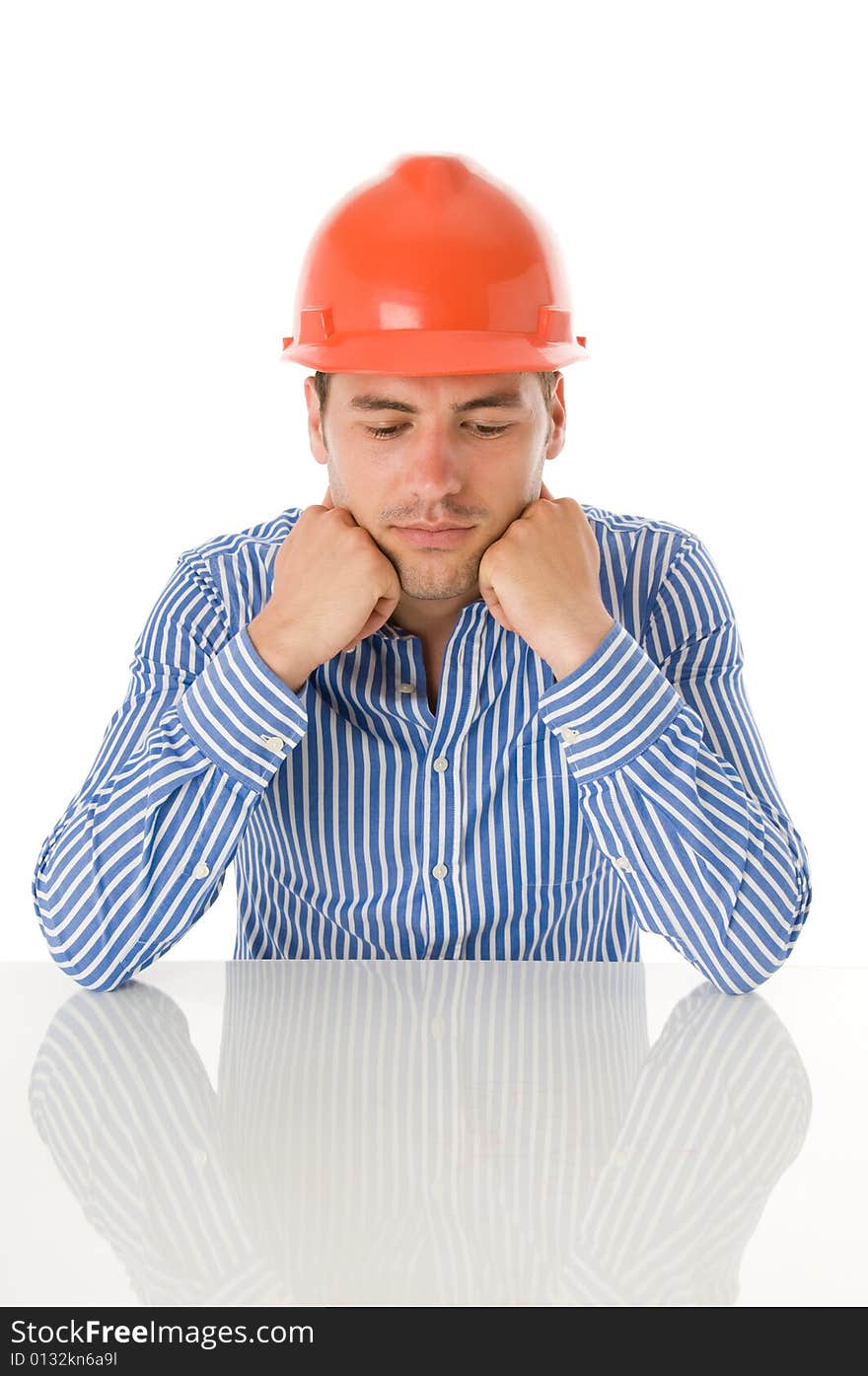 Portrait of thinking architect at work isolated on white background