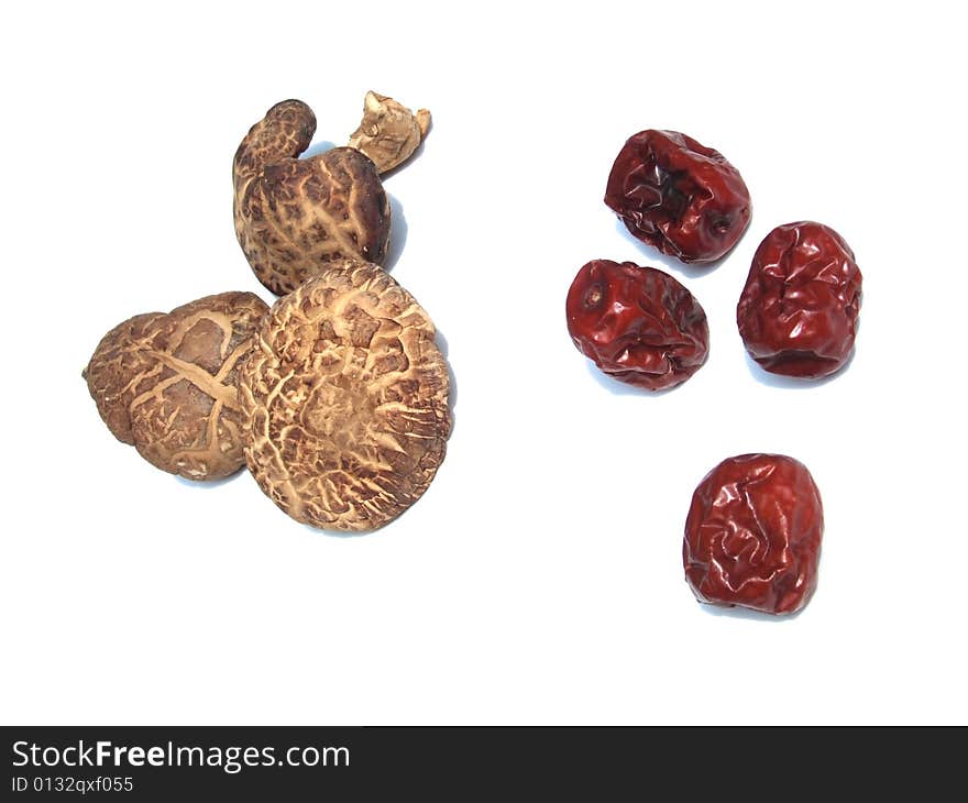 Dried mushroom and jujube with white background