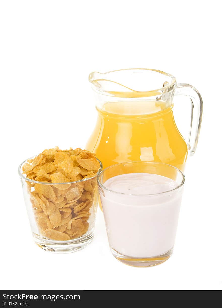 Corn flakes,yoghurt and orange juice. Corn flakes,yoghurt and orange juice