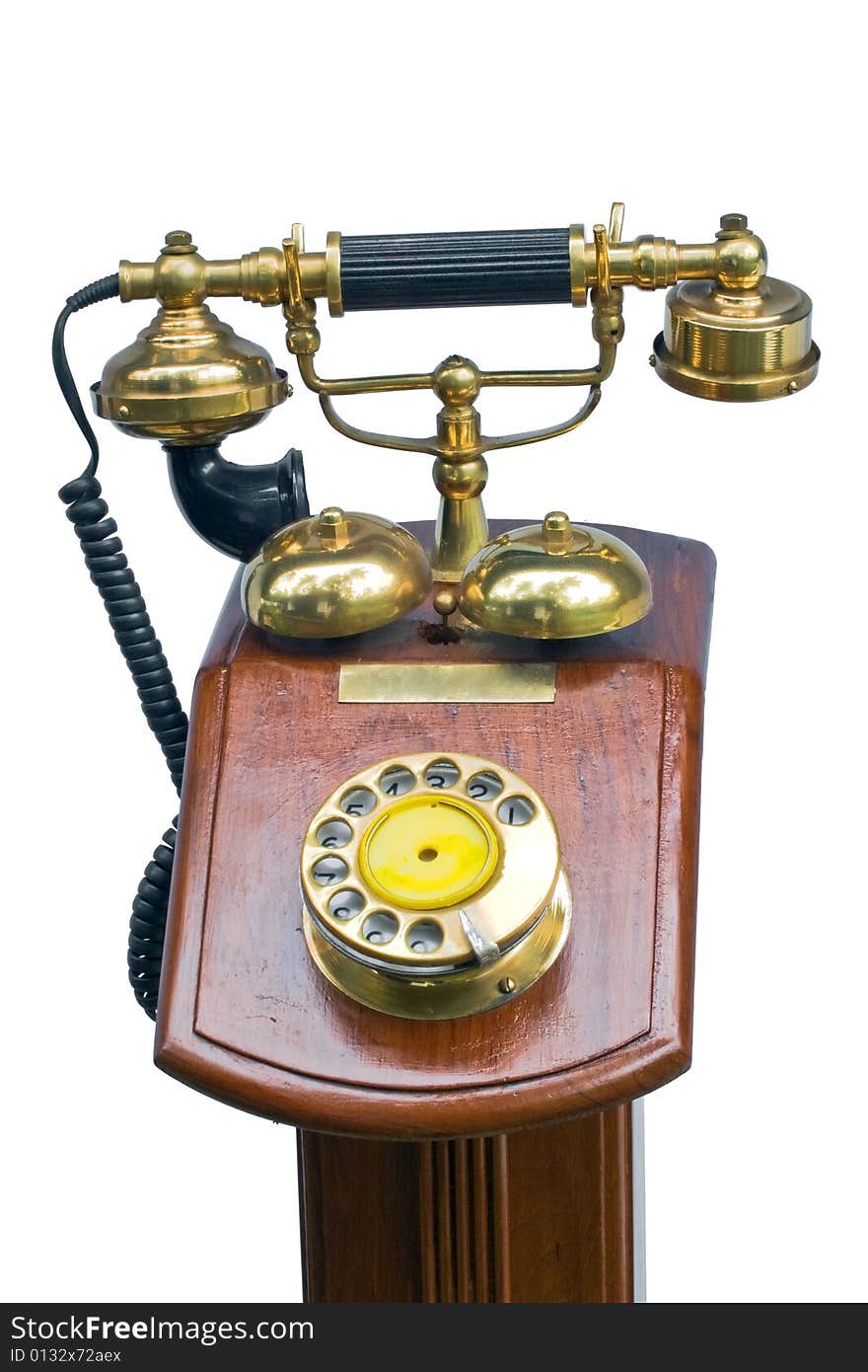 A vintage telephone on white background. A vintage telephone on white background