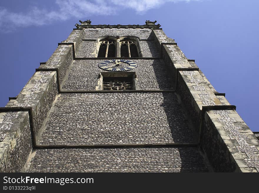 Church tower taken directly from the foot of it towards the sky