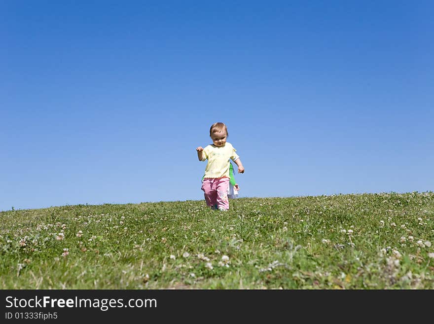 Active family on green meadow. Active family on green meadow