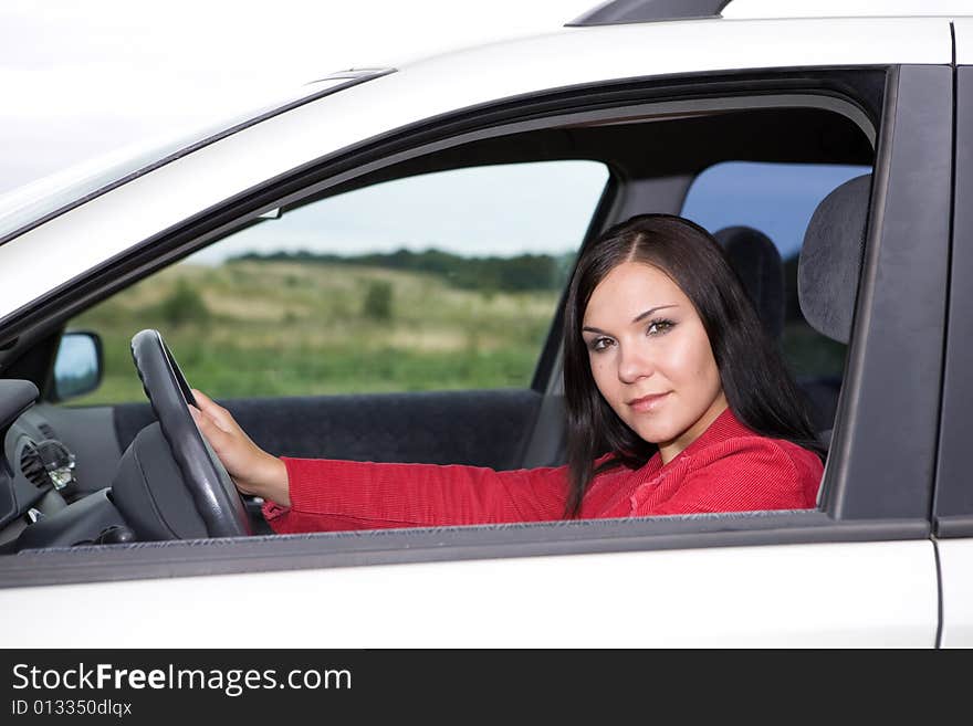 Casual woman traveling by car. Casual woman traveling by car