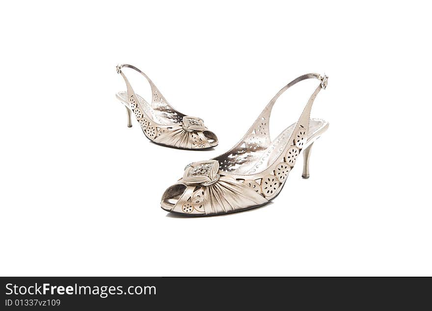 Isolated lady shoes with some jewels. Isolated lady shoes with some jewels