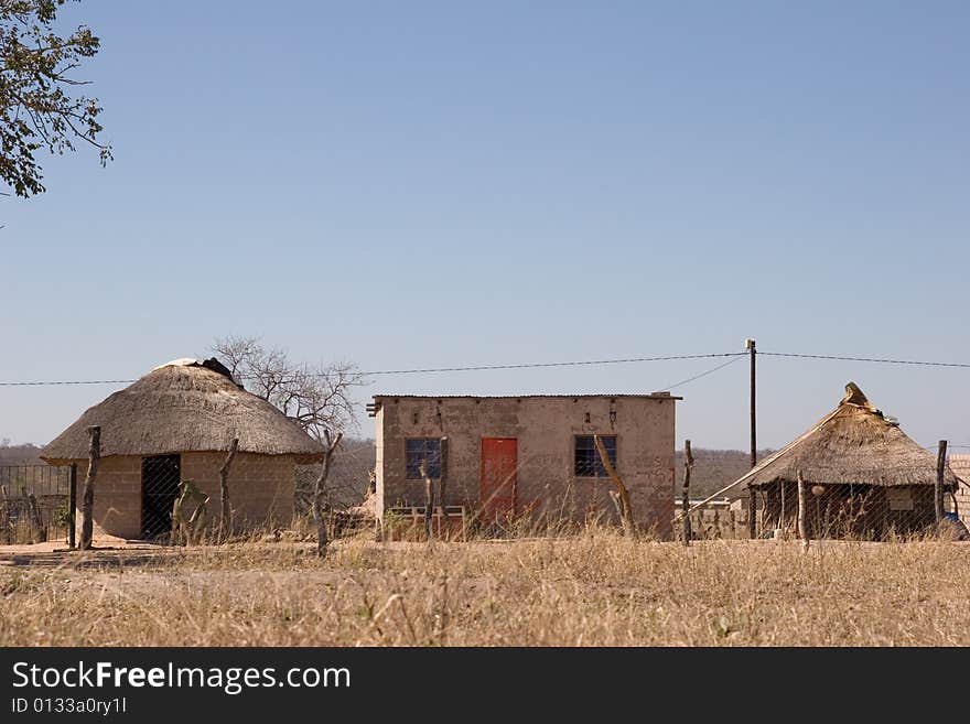 Just off the big cities of south africa there is landscape, hut in the old style of the african tribes. Just off the big cities of south africa there is landscape, hut in the old style of the african tribes