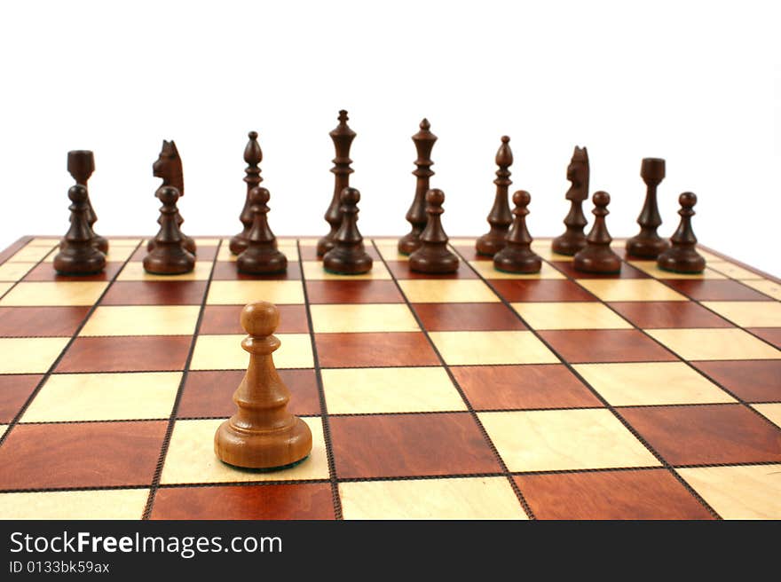 Wooden chess on wooden chessboard in studio