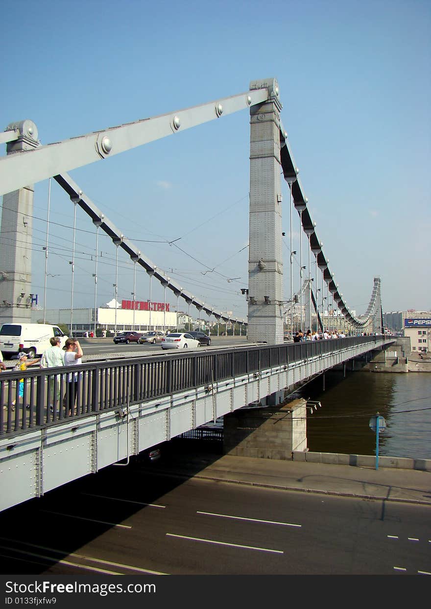 Bridge of Bogdan Khmelnitskiy or the Kiev bridge the steel arch foot bridge through Moscow - the river in Moscow