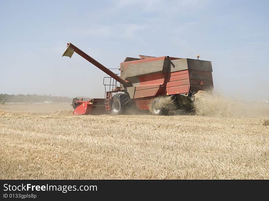 Grain harvester a hot summer day