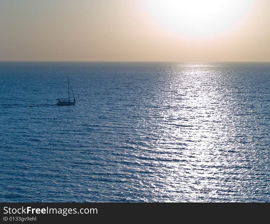 Small yacht floating in the sea