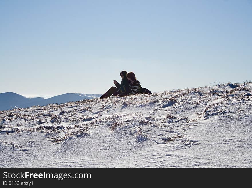 Silhouetas Of Girls In Winter Mountains