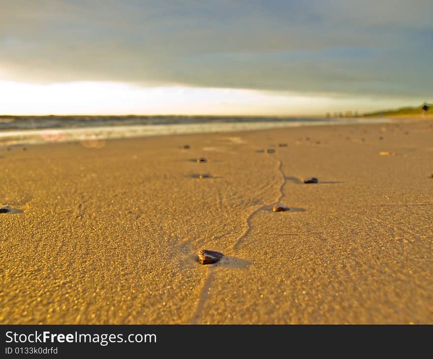 Stone way on the sand