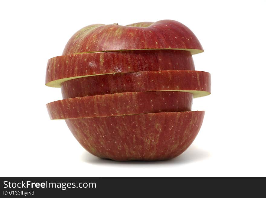 Sliced fresh red apple on white background.