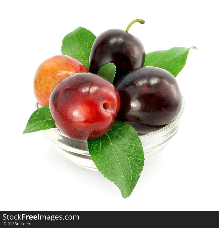 Plum Fruits With Green Leafs Isolated