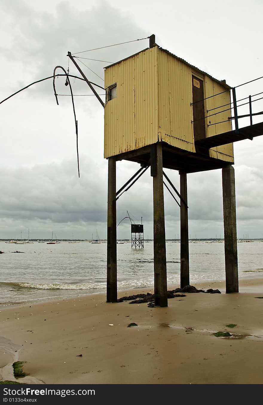 A classic oyster hut on a beach in Saint Nazaire, France