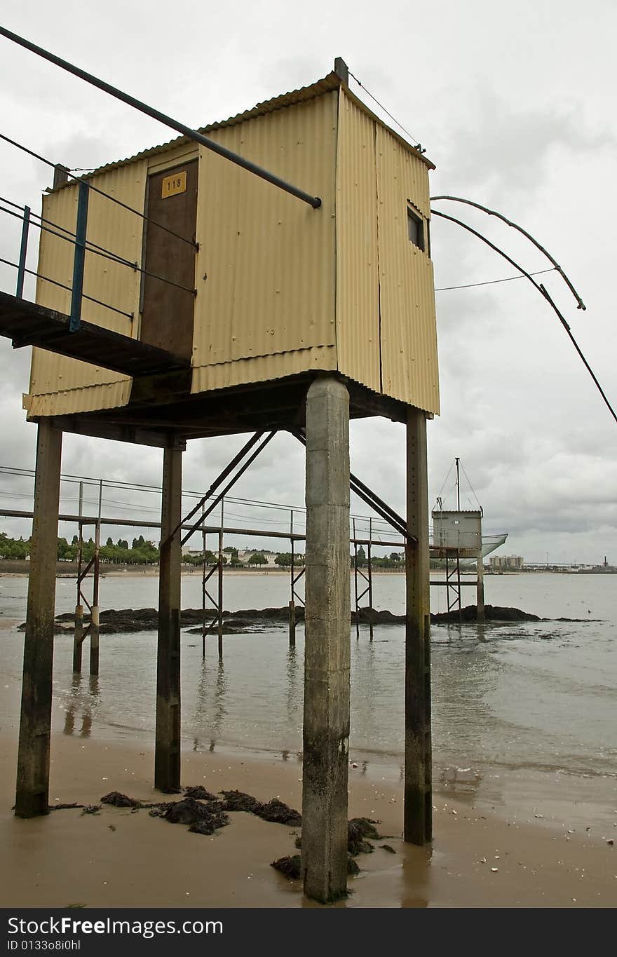 A classic oyster hut on a beach in Saint Nazaire, France. A classic oyster hut on a beach in Saint Nazaire, France