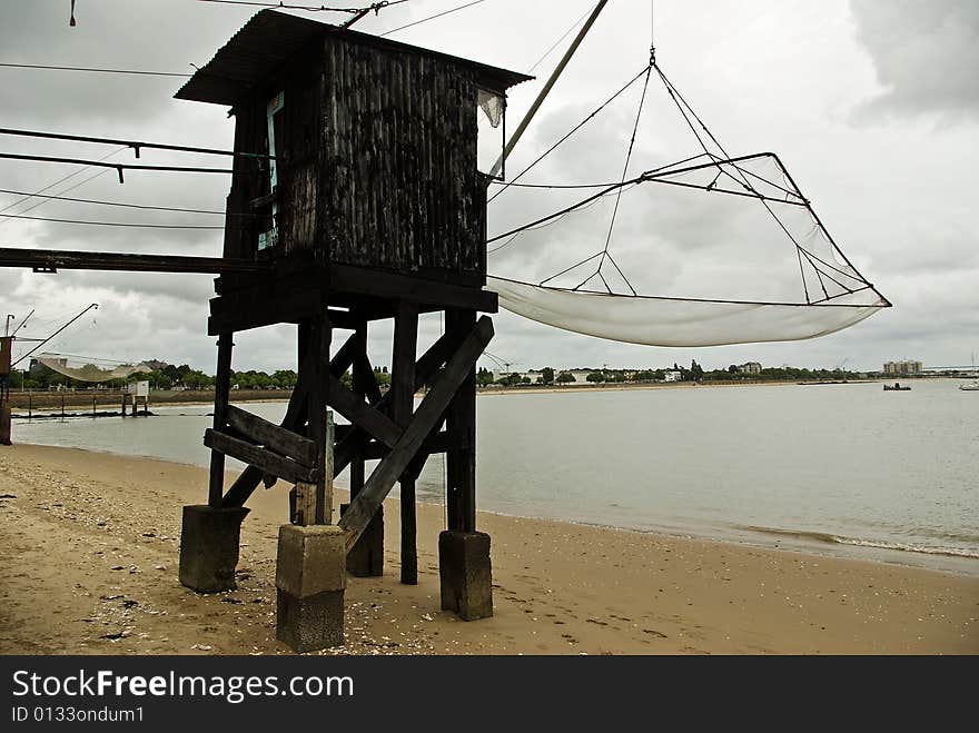 A classic oyster hut on a beach in Saint Nazaire, France. A classic oyster hut on a beach in Saint Nazaire, France