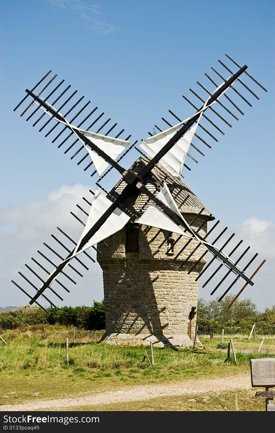 A classic French windmill on a bright summer's day