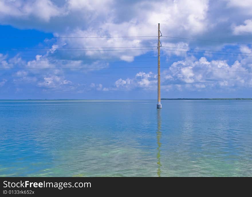 Telephone line standing in the water