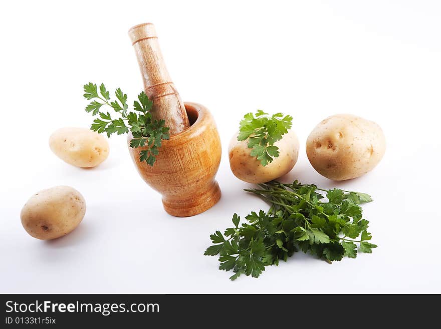 Mortar and pestle, kitchen scene shot in studio, isolated on white background. Mortar and pestle, kitchen scene shot in studio, isolated on white background