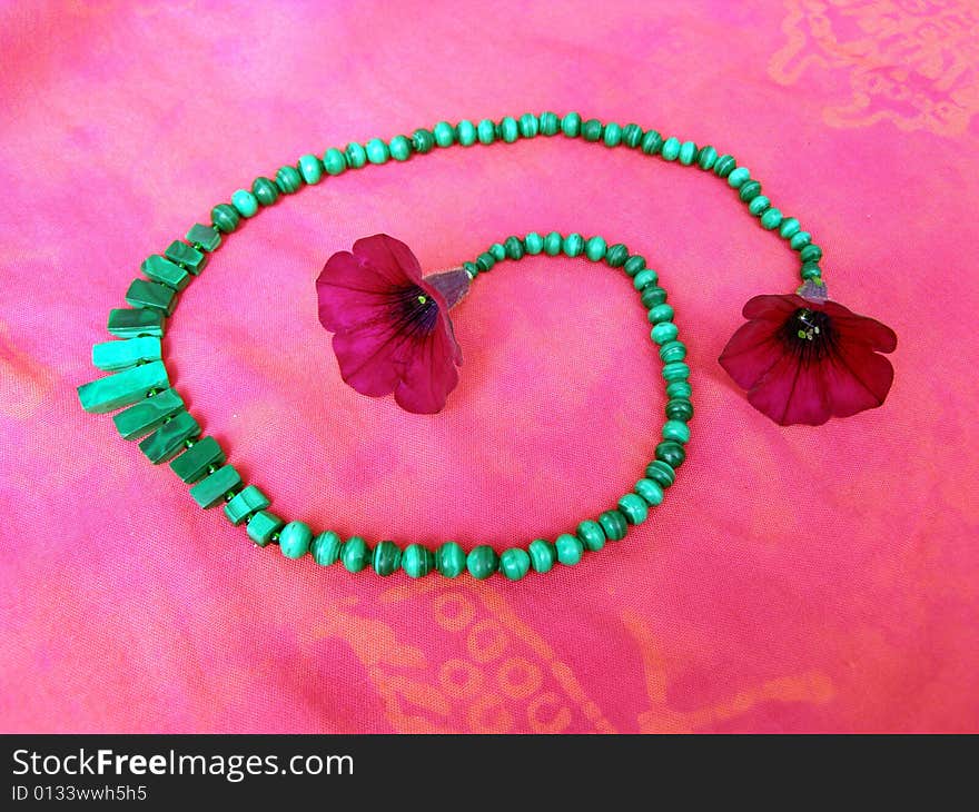 Green necklace with flowers