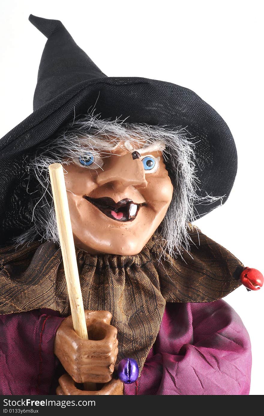 Witch doll close up.