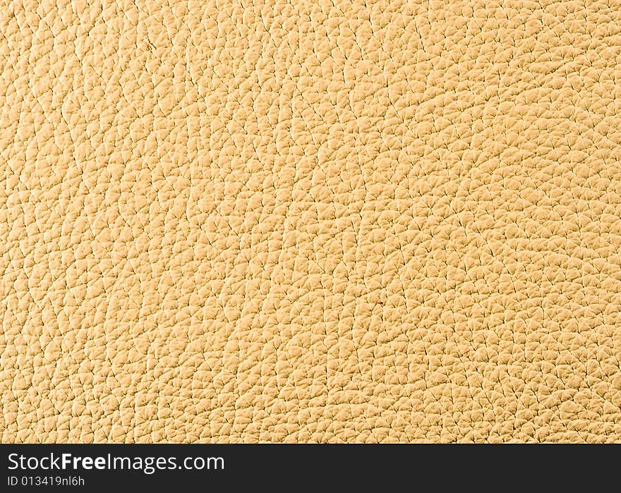 Natural qualitative beige leather texture. Close up. Natural qualitative beige leather texture. Close up.