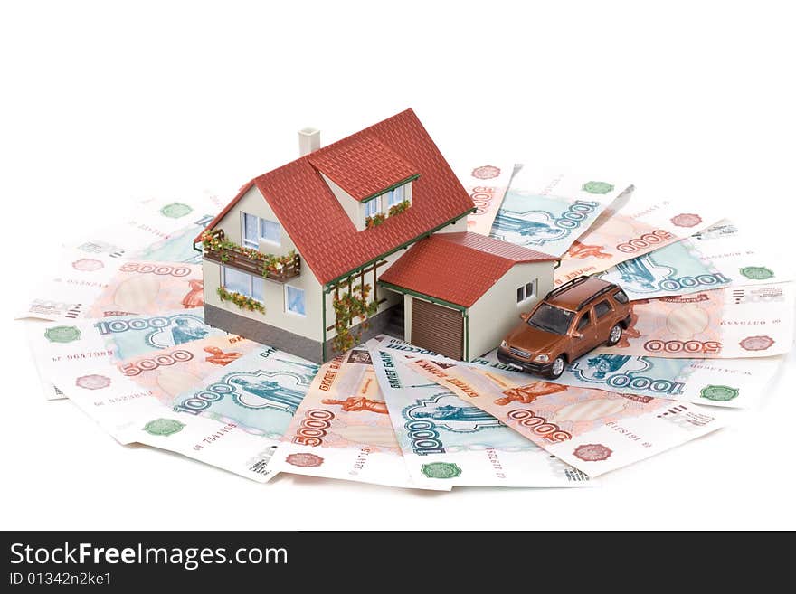 Miniature House and Money. Buying house concept