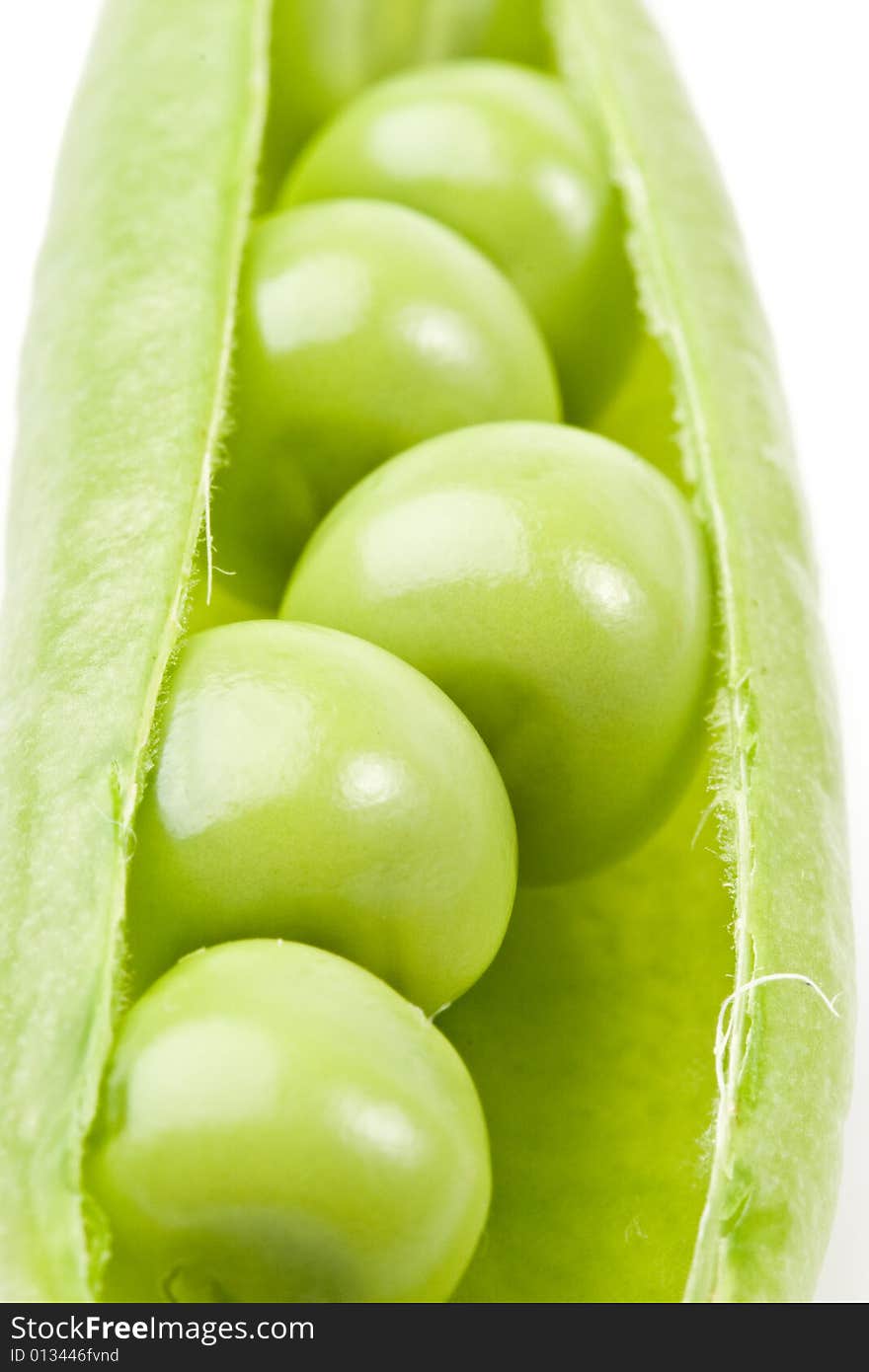 Fresh pods of peas on a white background. Fresh pods of peas on a white background