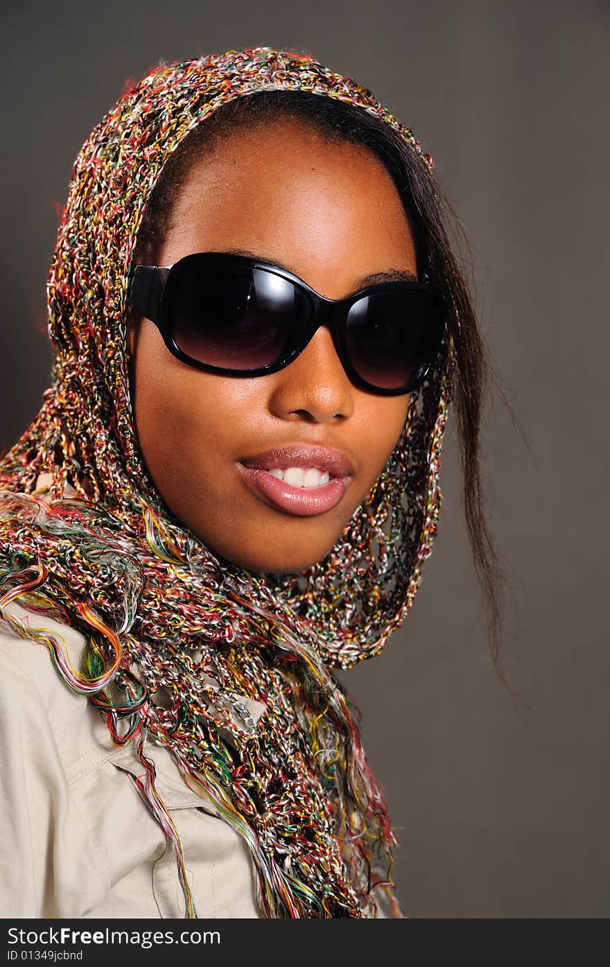 Portrait of yong trendy african female model with sunglasses. Portrait of yong trendy african female model with sunglasses