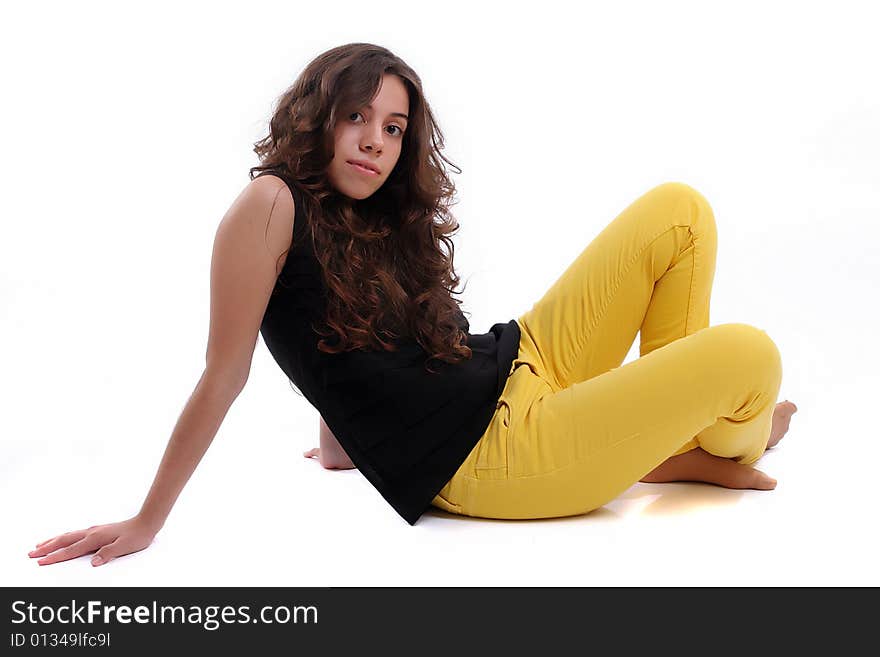 Young beautiful woman posing on white background