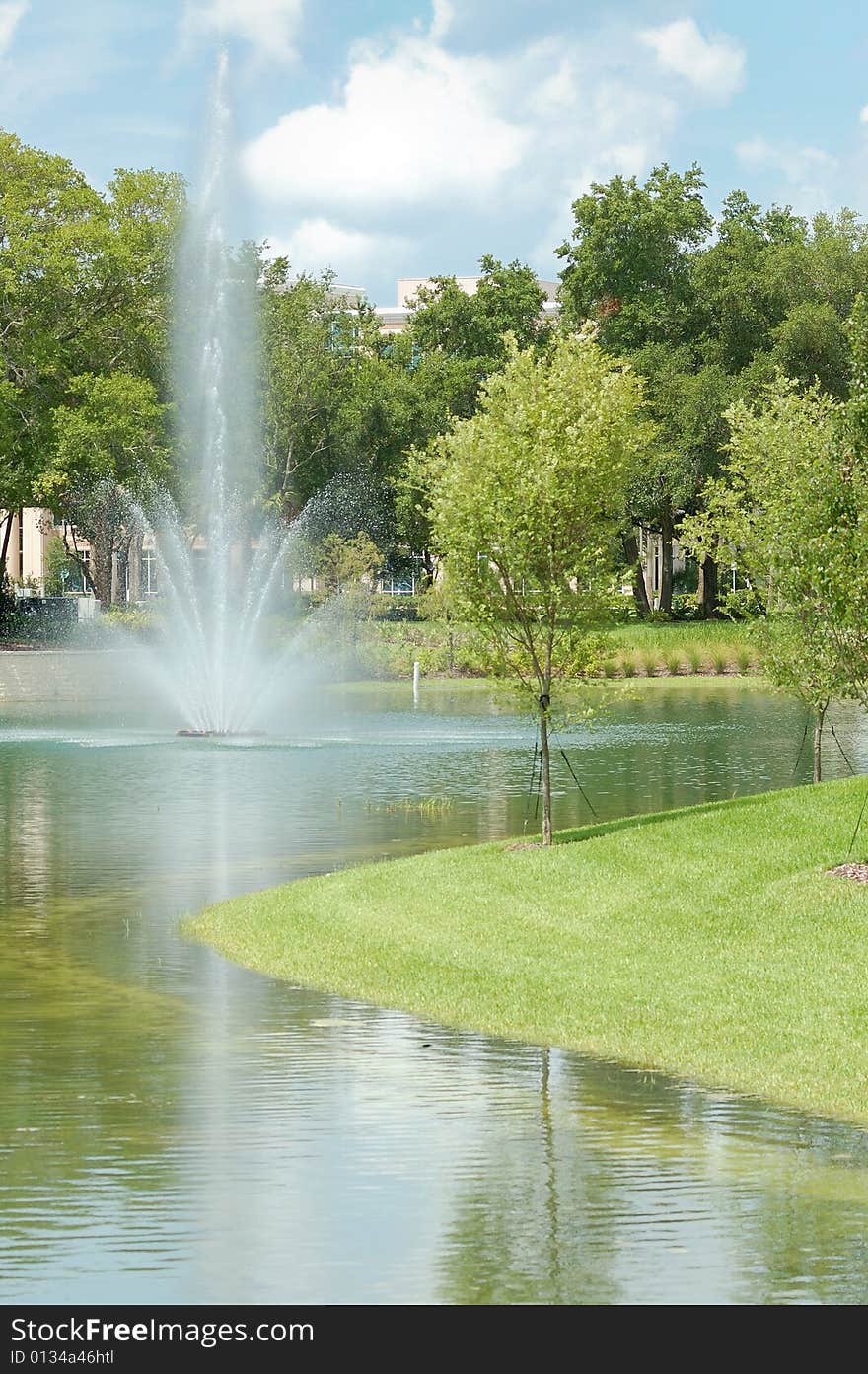 Fountain and blue skies at park. Fountain and blue skies at park.