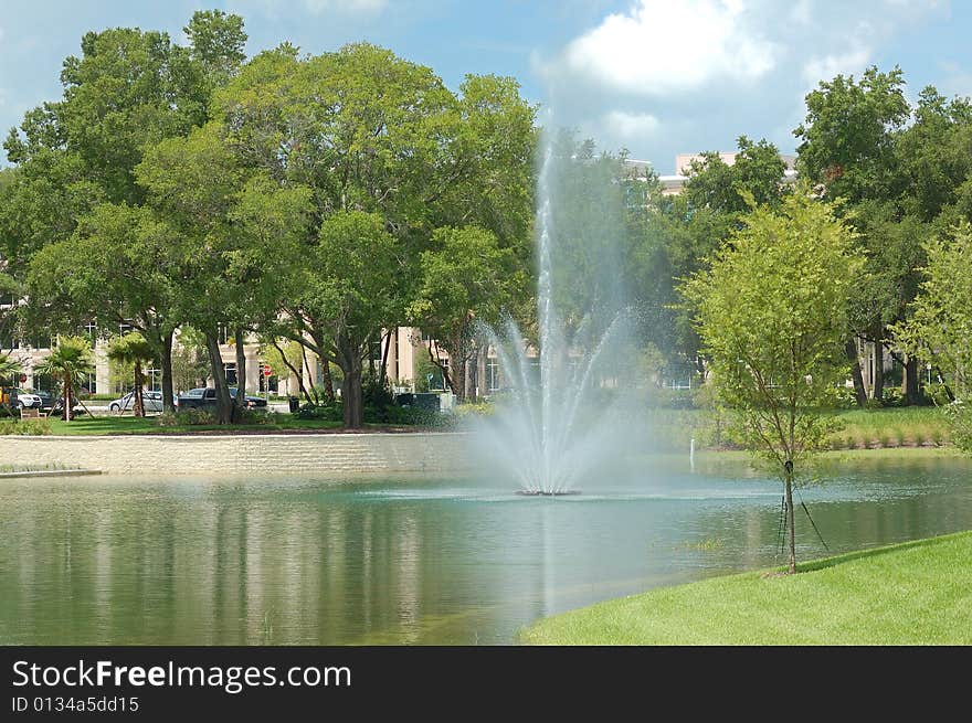 Fountain and blue skies at park. Fountain and blue skies at park.