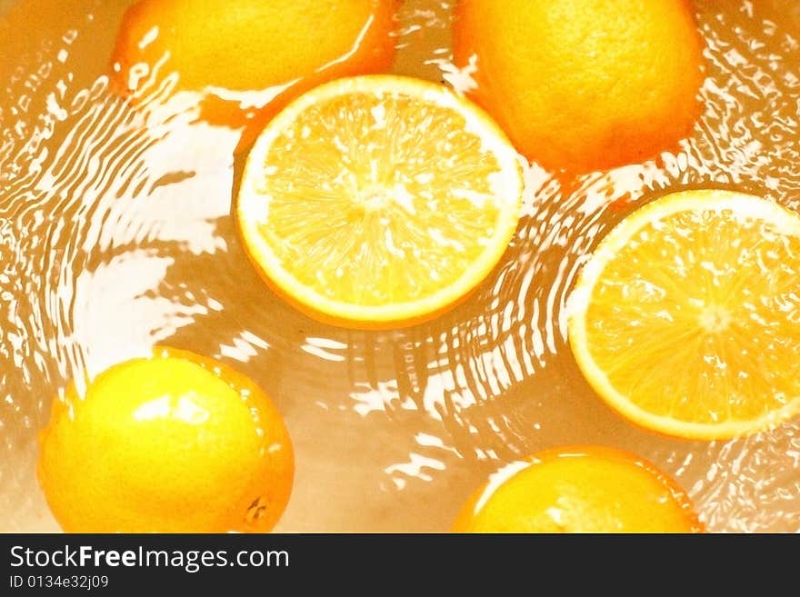 Fresh fruit oranges, - swim in juice, water. Fresh fruit oranges, - swim in juice, water.