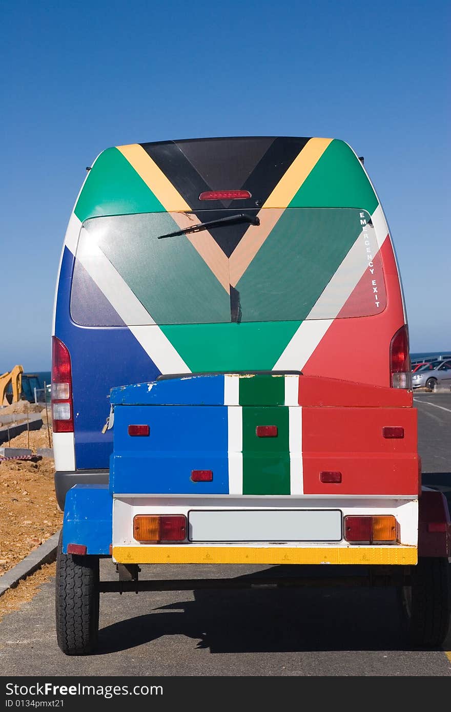 The symbol of south africa just in the back of the bus. The symbol of south africa just in the back of the bus.