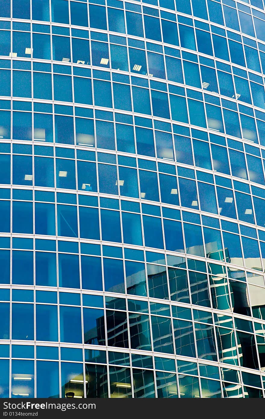 Reflections in windows of a beautiful modern skyscraper