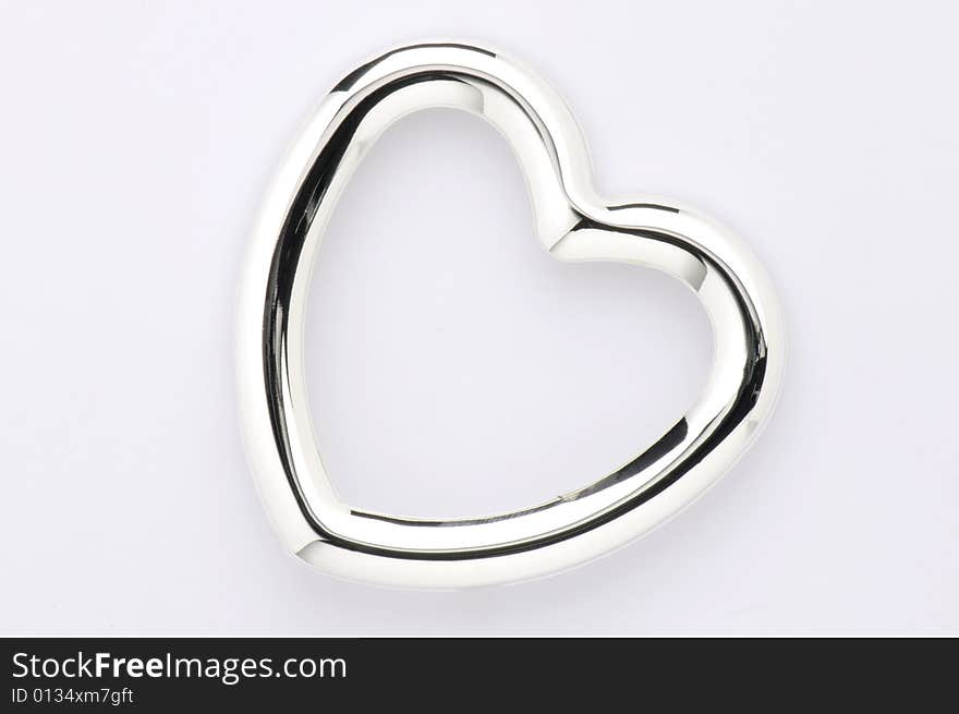 This picture shows a heart from silver. This picture shows a heart from silver