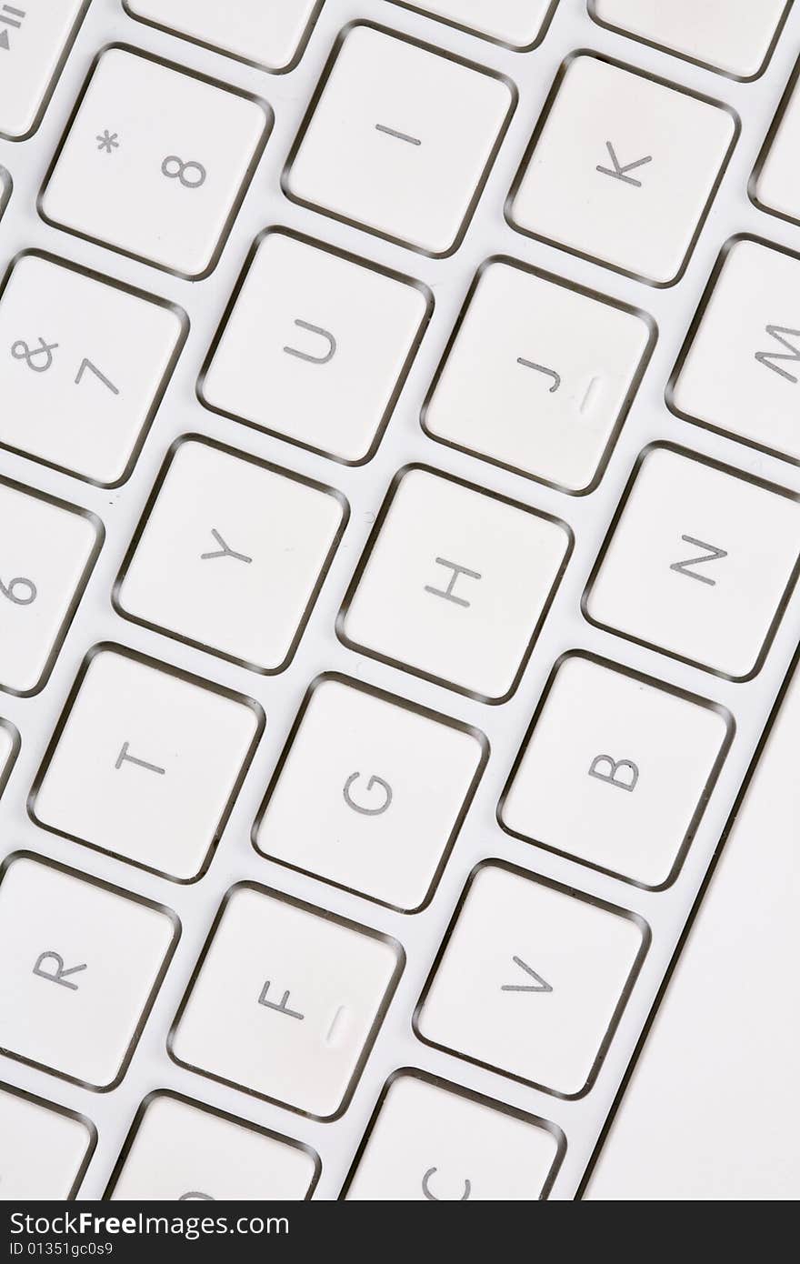 A white keyboard with letters and numbers.