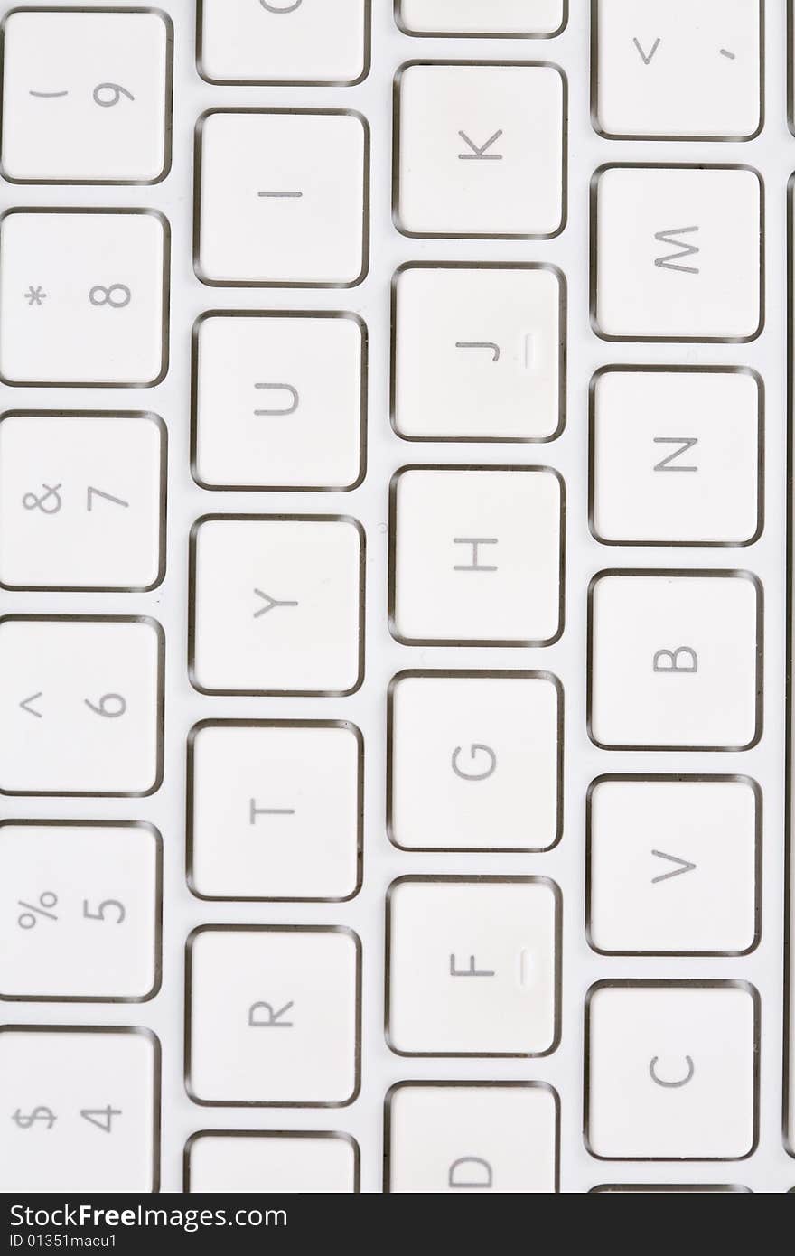 White Keyboard With Letters And Numbers.