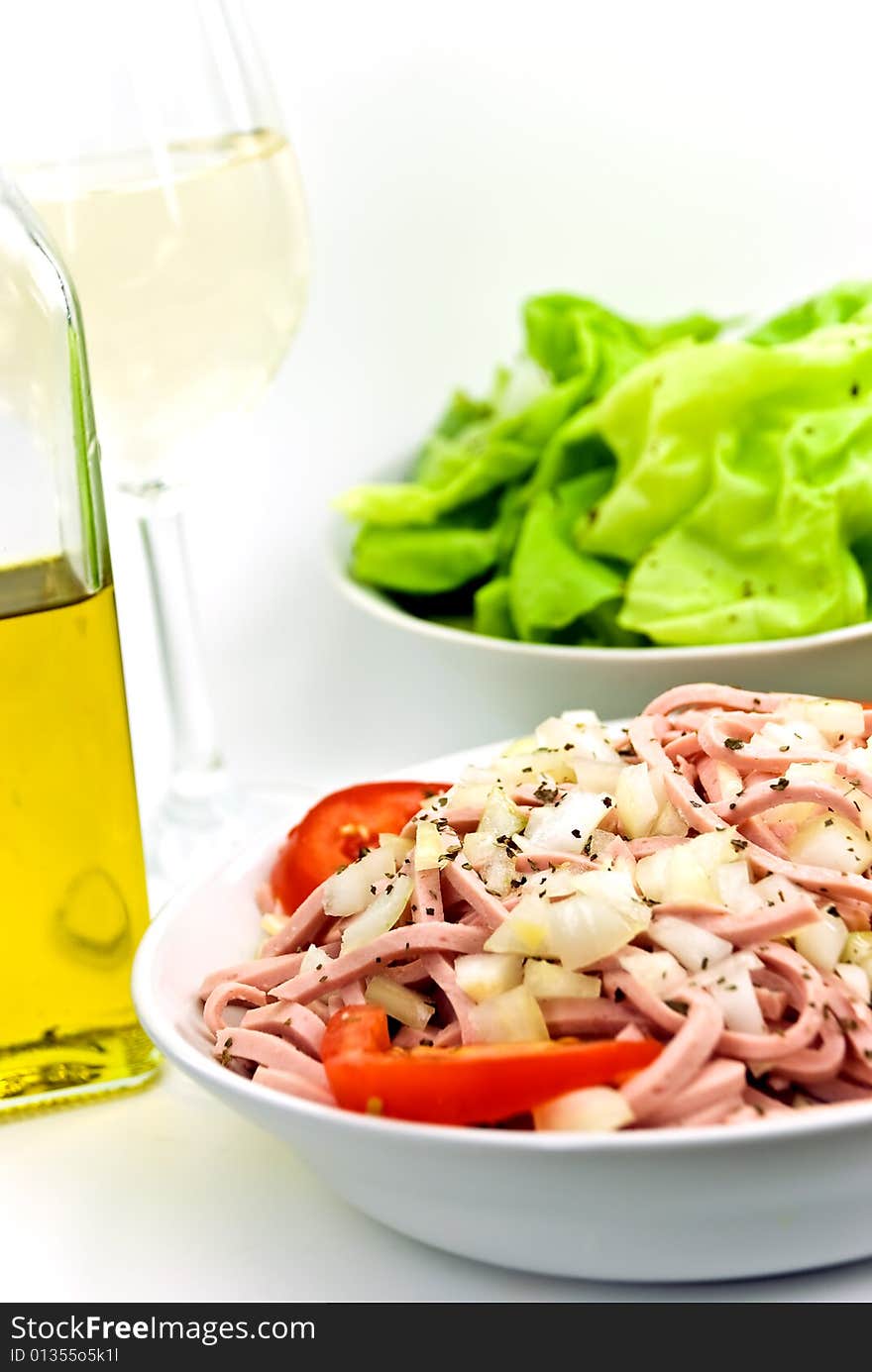 Gourmet meat salad with tomato,onion,lettuce.