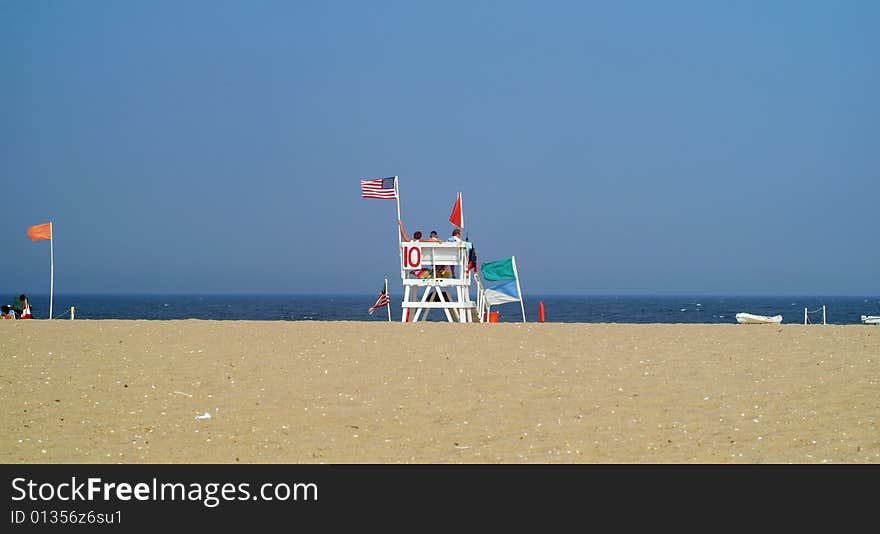 Lifeguard chair on beach with wide angle