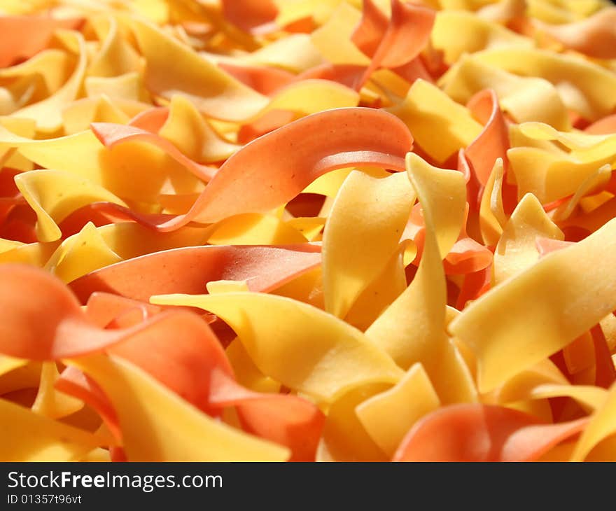 Yellow noodles and red noodles, close-up