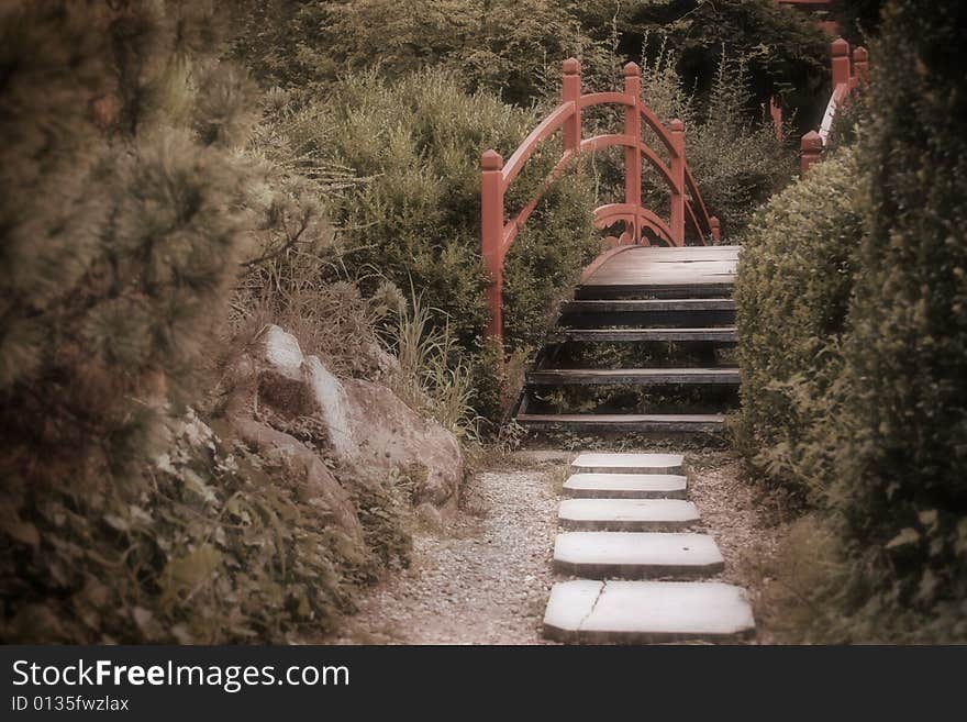 Japanese bridge in a botanical garden. Japanese bridge in a botanical garden