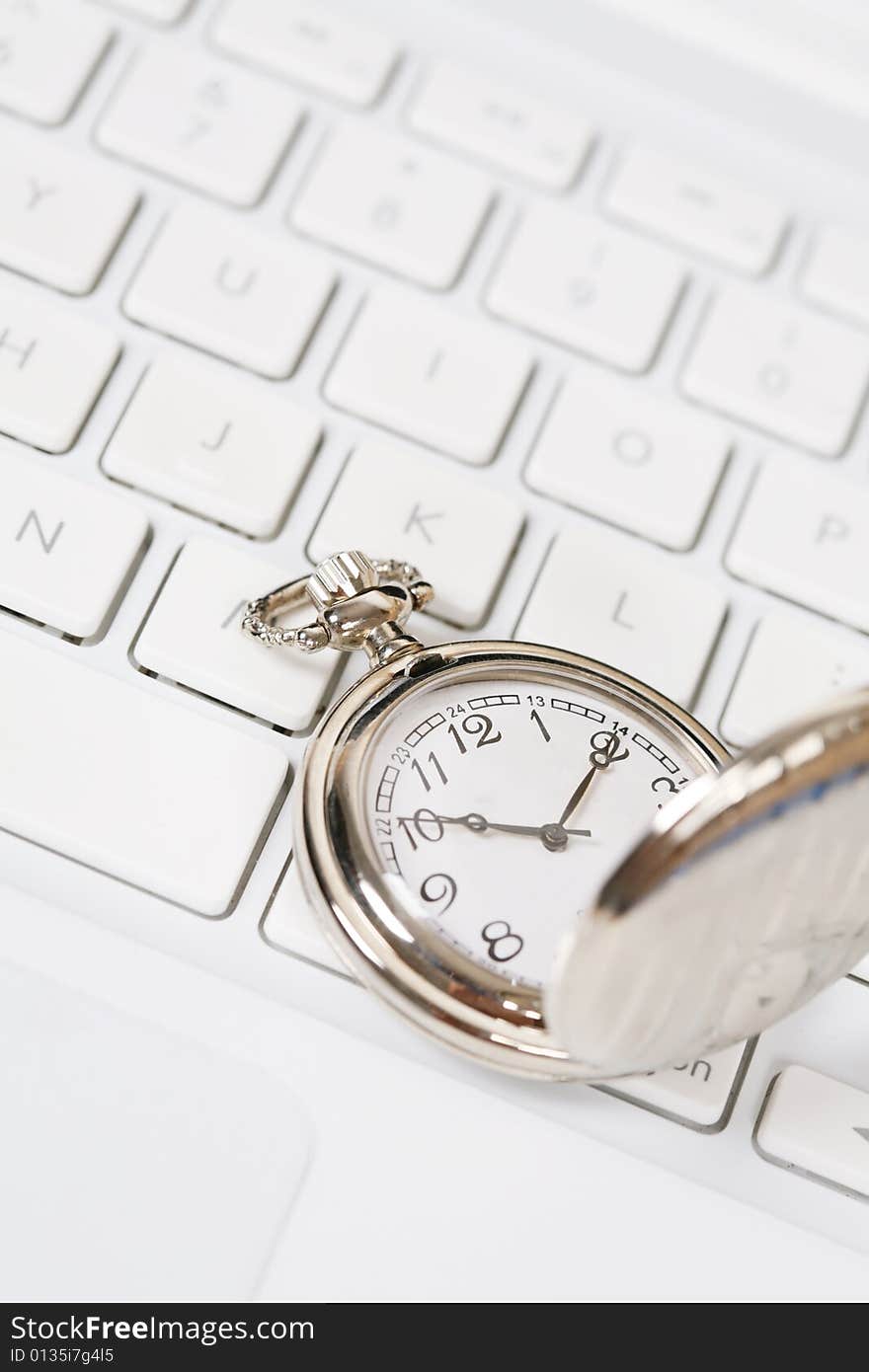 Pocket watch with white keyboard. Pocket watch with white keyboard