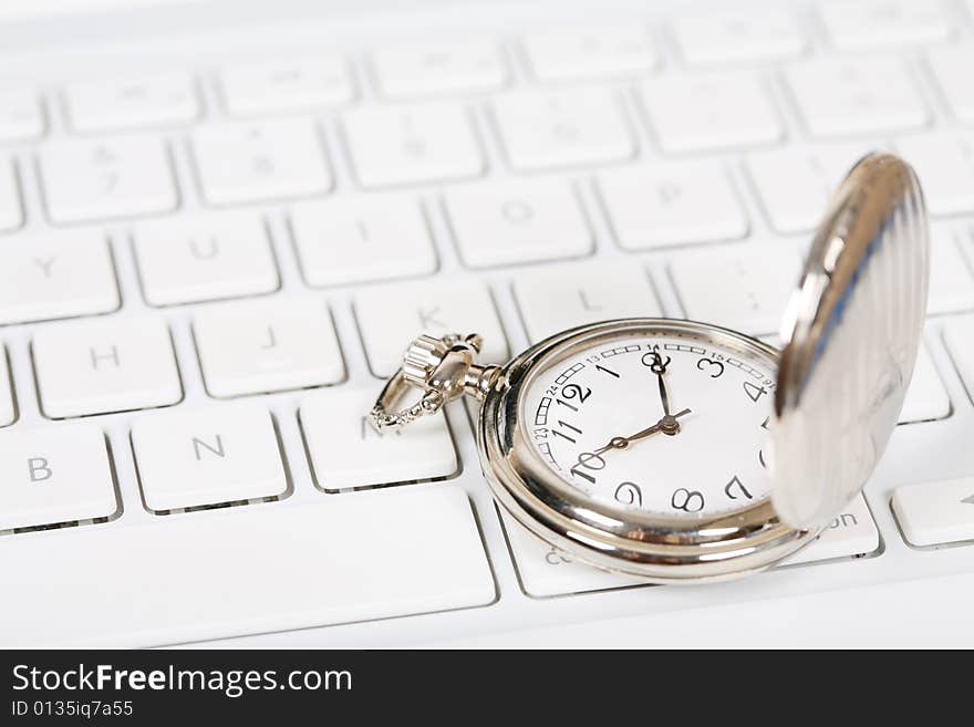 Pocket watch with white keyboard. Pocket watch with white keyboard