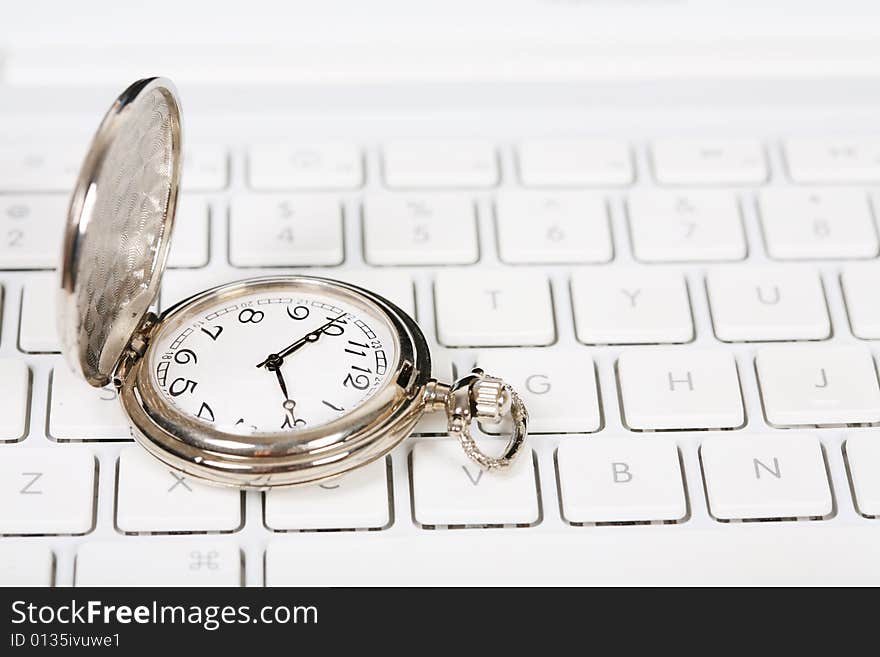 Pocket watch with white keyboard. Pocket watch with white keyboard