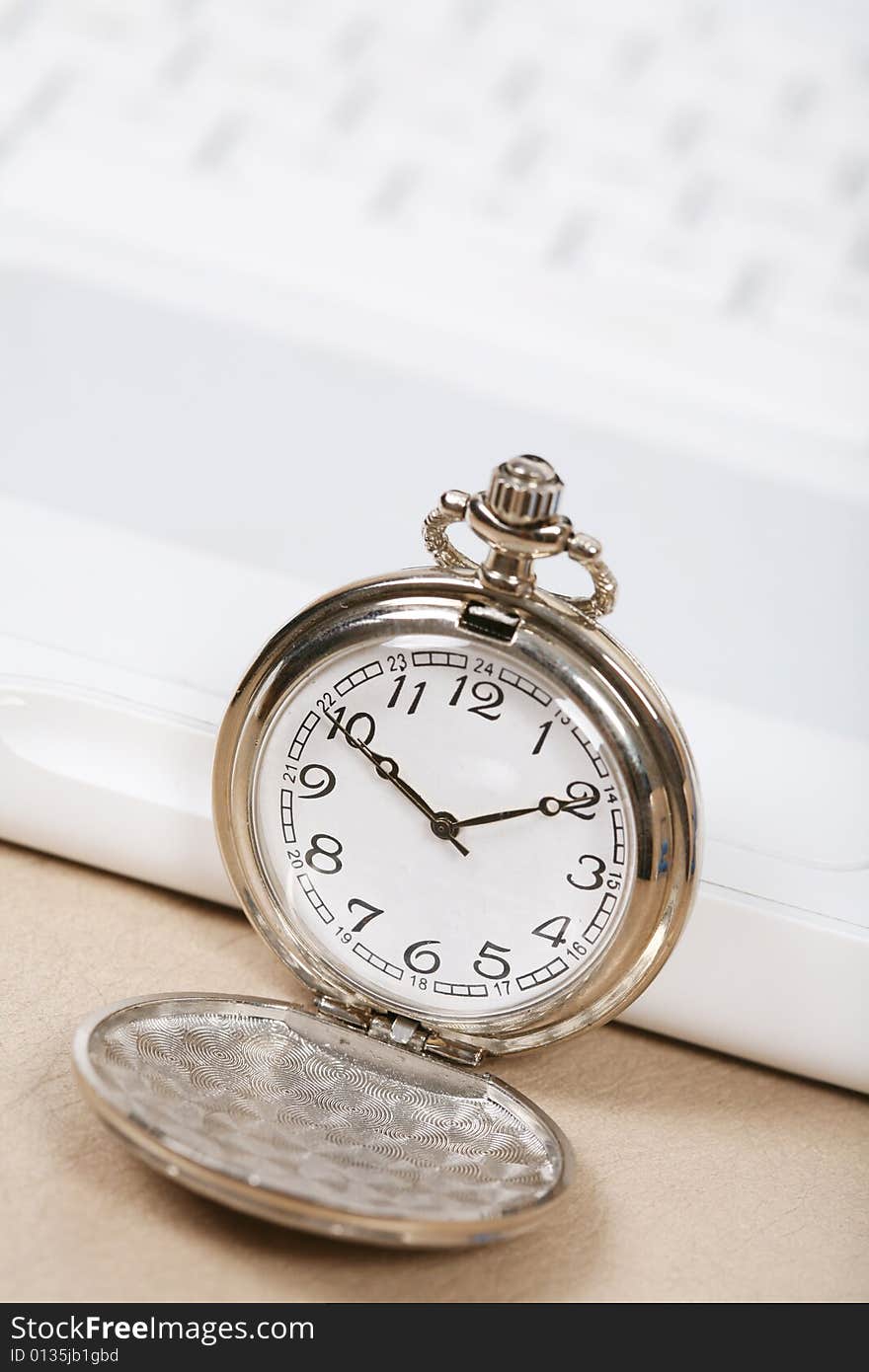 Pocket watch with white keyboard. Pocket watch with white keyboard